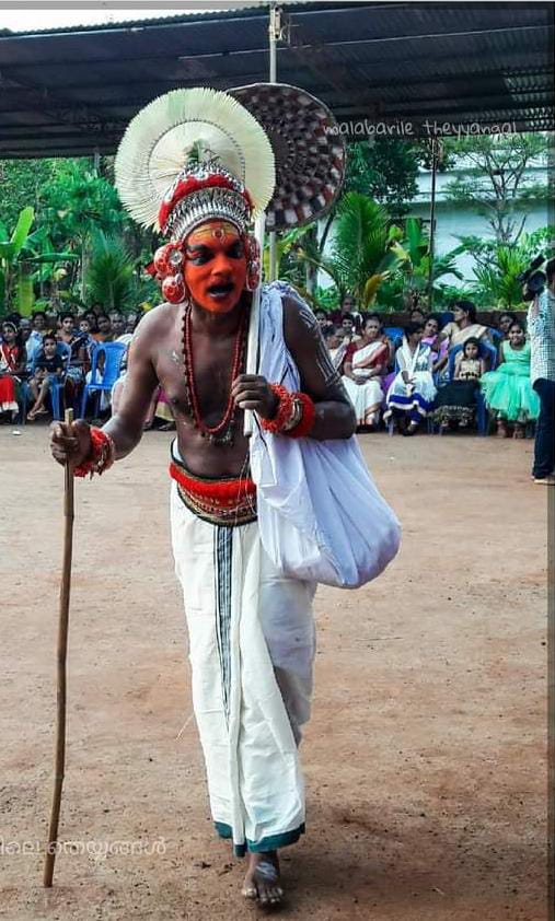 Kummalunni Theyyam