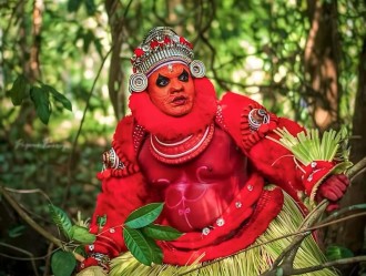 Chuvanna Gulikan Theyyam