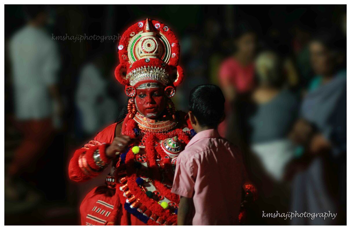 Chuvanna Gulikan Theyyam